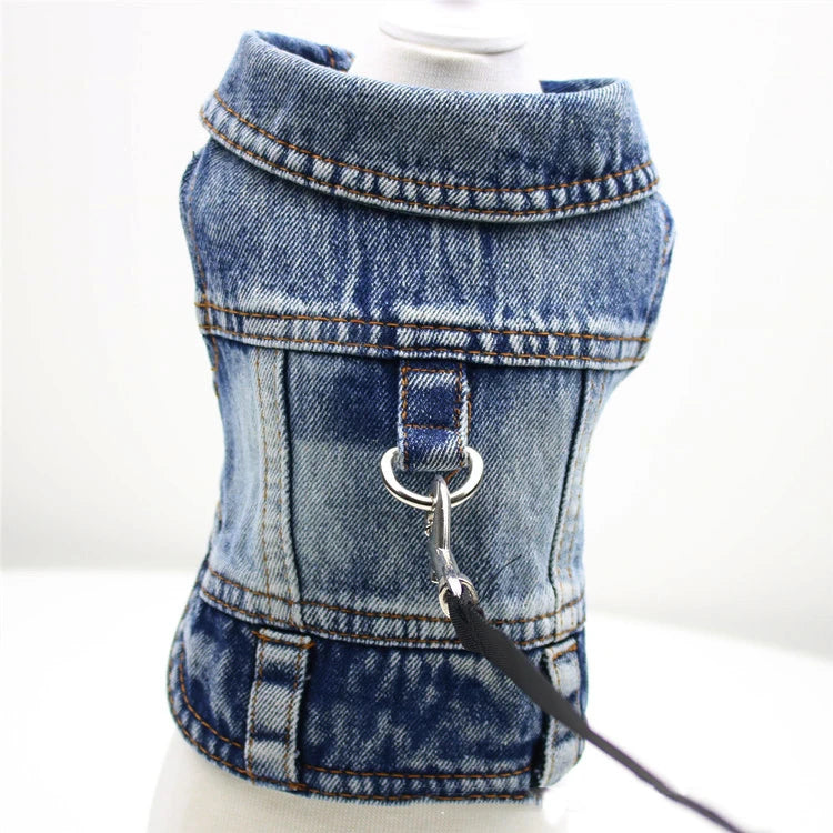 Denim dog vest with a leash on a mannequin against a white background